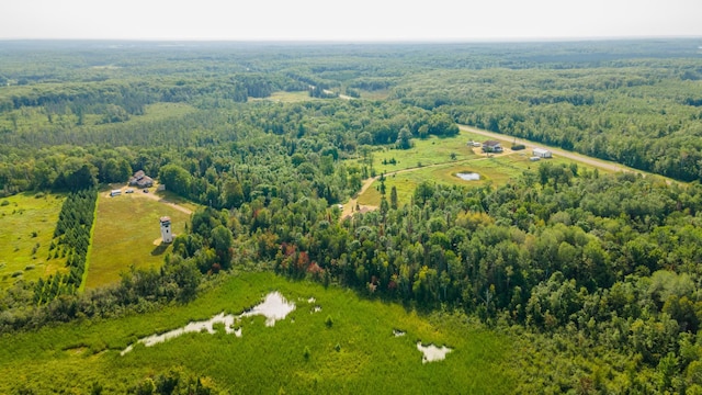 aerial view featuring a forest view