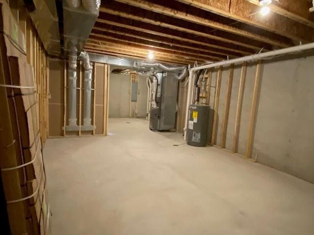 basement with heating utilities and water heater