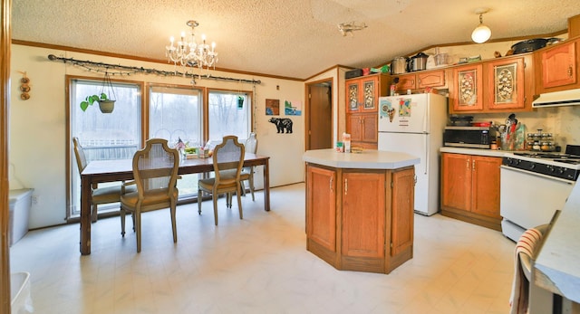 kitchen with white appliances, a kitchen island, brown cabinets, light floors, and under cabinet range hood