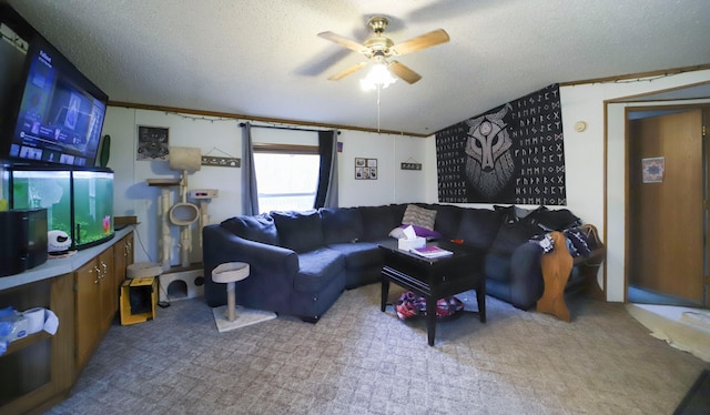 living room featuring a textured ceiling, carpet flooring, and a ceiling fan