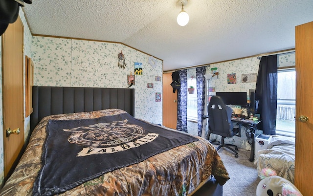 carpeted bedroom with vaulted ceiling, ornamental molding, a textured ceiling, and wallpapered walls