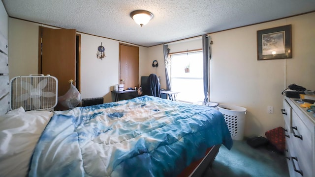 bedroom featuring a textured ceiling