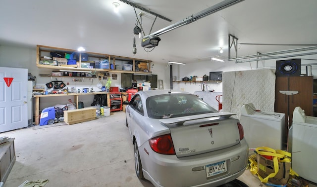 garage featuring a workshop area and a garage door opener