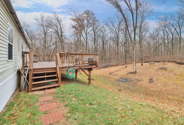 view of yard featuring a deck