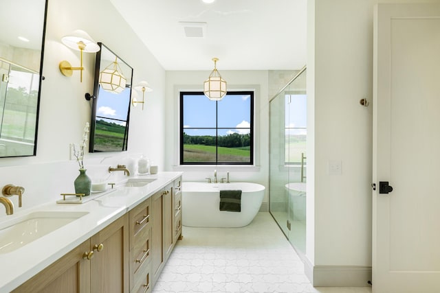 bathroom featuring vanity and plus walk in shower