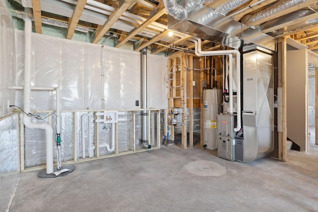 basement featuring water heater and heating unit