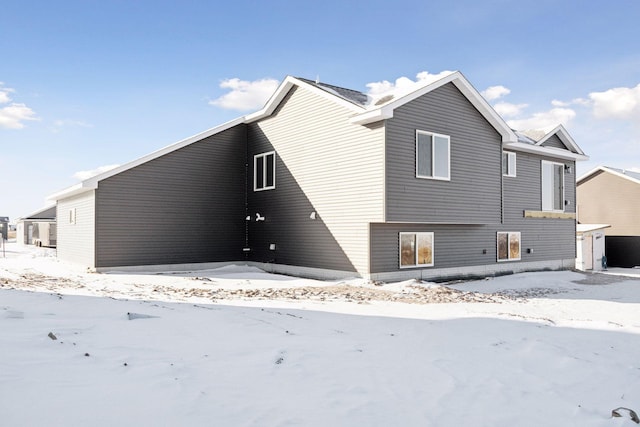 view of snow covered house