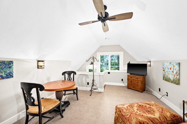 office area with lofted ceiling, light colored carpet, and ceiling fan