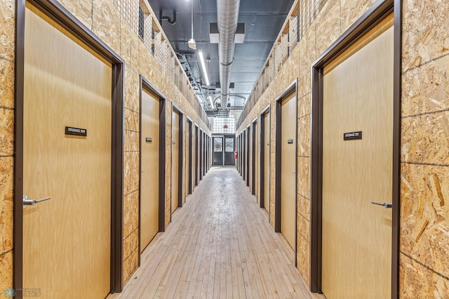 hallway featuring wood-type flooring