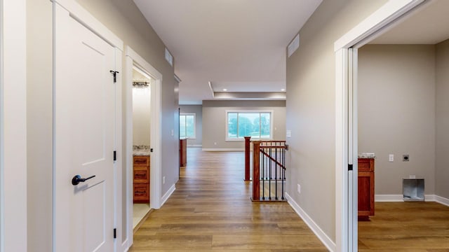 hallway featuring hardwood / wood-style floors