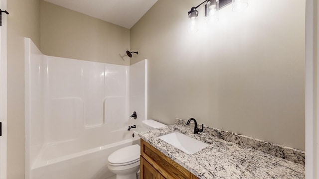 full bathroom featuring vanity, toilet, and  shower combination