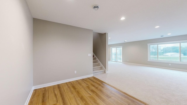 unfurnished room featuring light hardwood / wood-style flooring