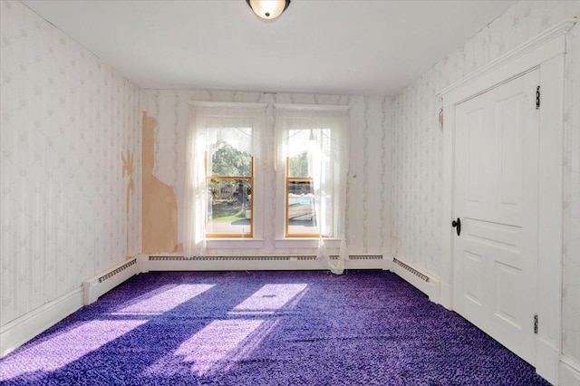 carpeted empty room featuring plenty of natural light