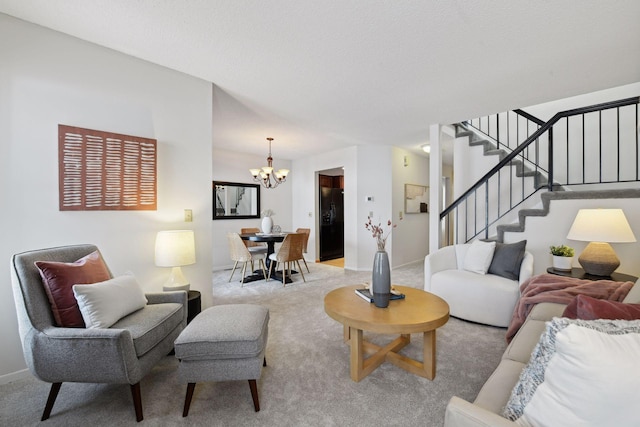 carpeted living room featuring a notable chandelier