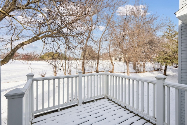 view of snow covered deck