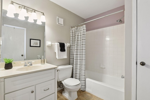 full bathroom featuring shower / bath combo with shower curtain, toilet, and vanity