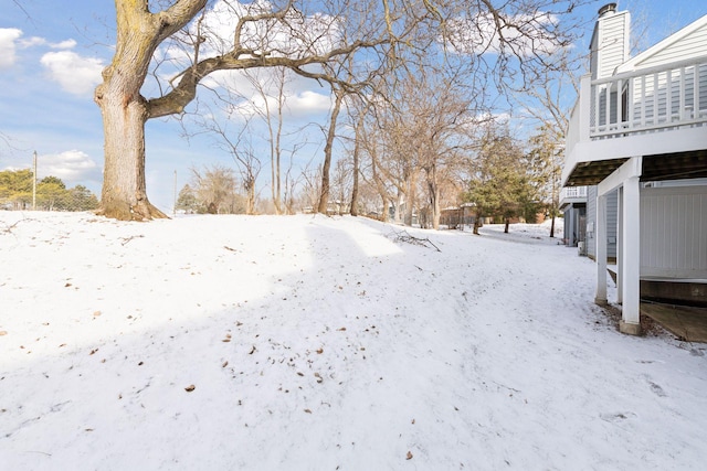 view of yard covered in snow