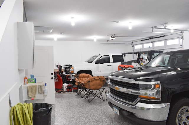 garage featuring a garage door opener