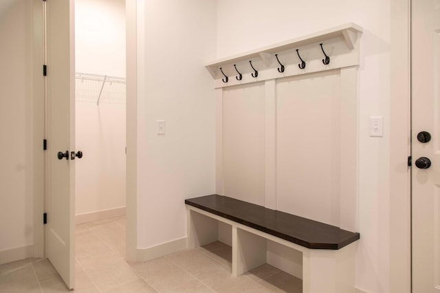 mudroom with light tile patterned flooring