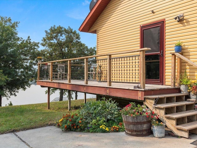 view of side of property with a deck