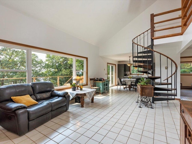 tiled living room featuring high vaulted ceiling