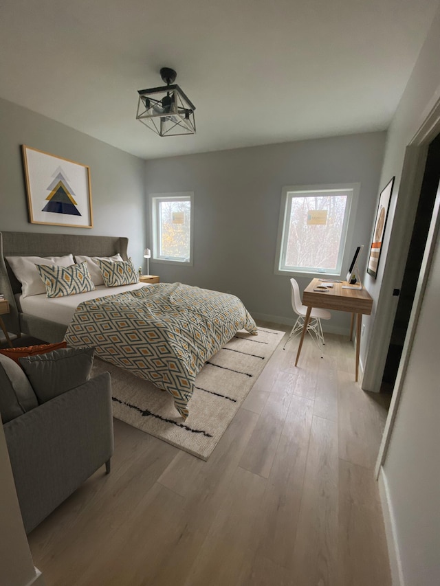 bedroom featuring hardwood / wood-style floors