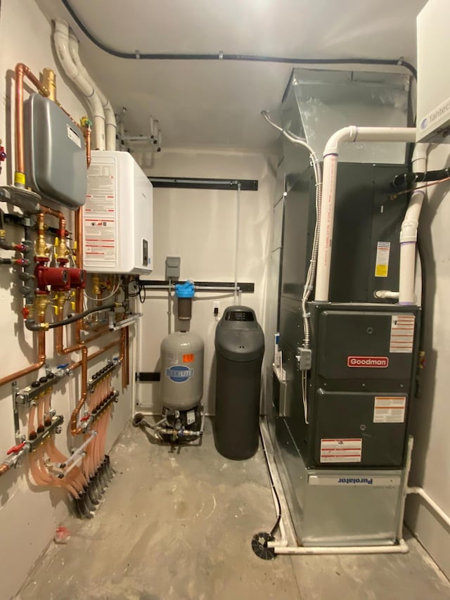 utility room with tankless water heater