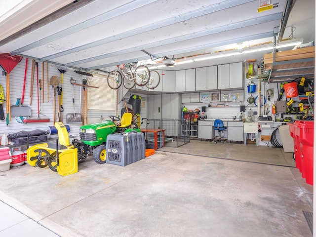 garage with a workshop area