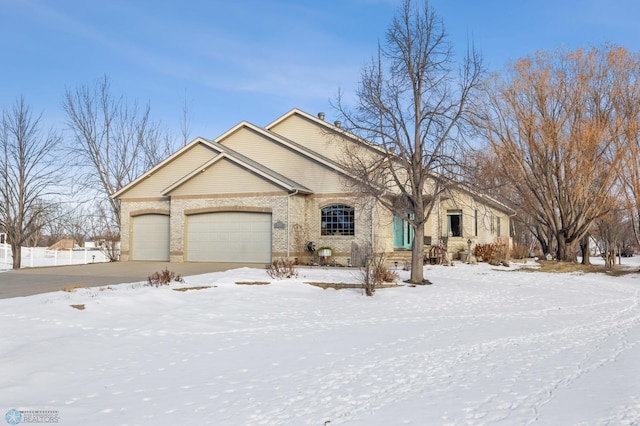 ranch-style home with a garage