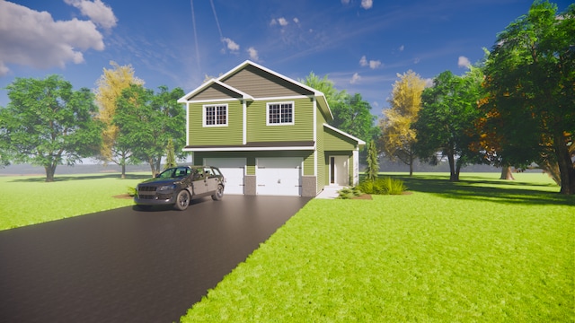 view of front of home with a garage and a front lawn