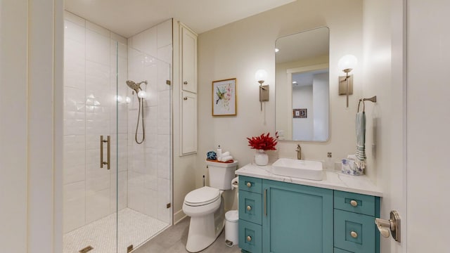 bathroom featuring tile patterned floors, vanity, an enclosed shower, and toilet