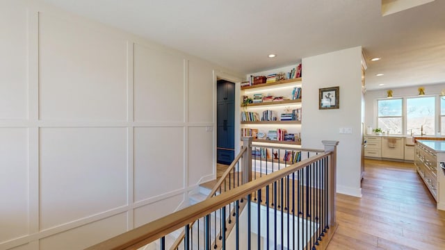 hallway featuring light wood-type flooring