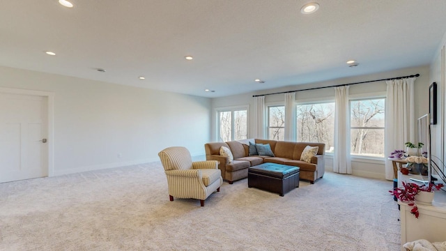 living room featuring light carpet