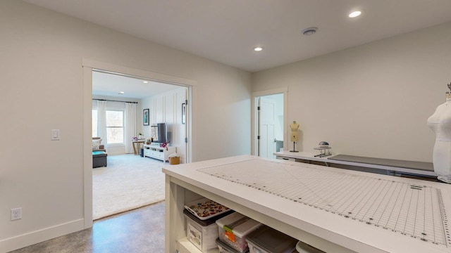 corridor with concrete flooring