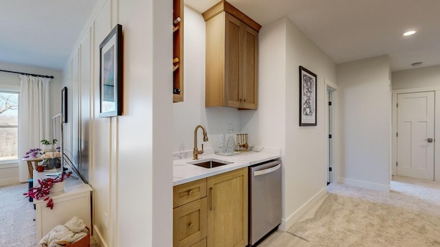 bar with sink, light colored carpet, and stainless steel dishwasher