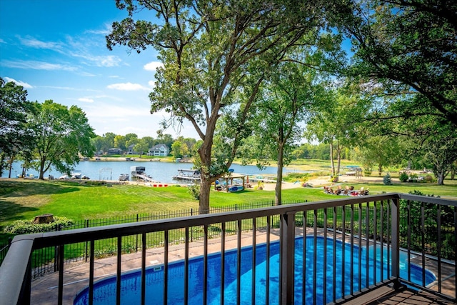 balcony featuring a water view