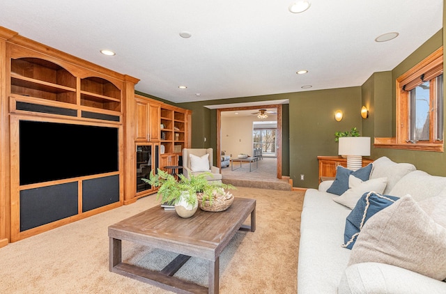 carpeted living room featuring a wealth of natural light