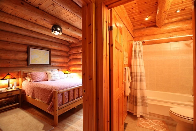 bedroom with wood ceiling, log walls, and beamed ceiling