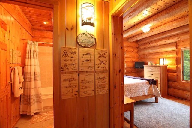 bedroom featuring beamed ceiling, wooden ceiling, and rustic walls