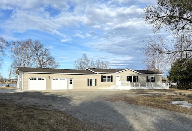 view of front of property featuring a garage