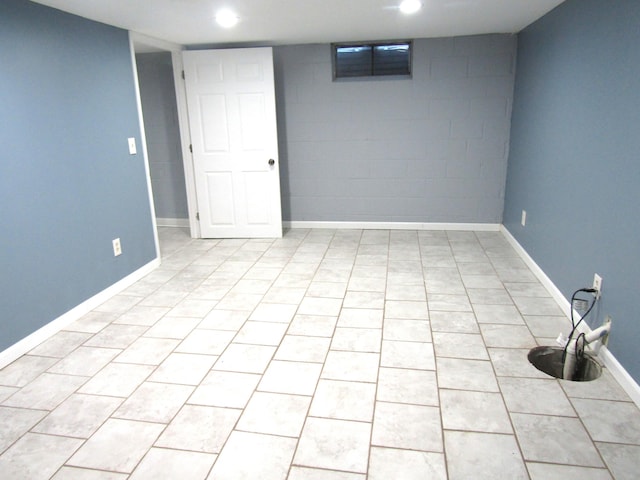 basement with light tile patterned floors