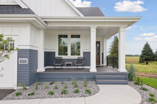 property entrance featuring a porch