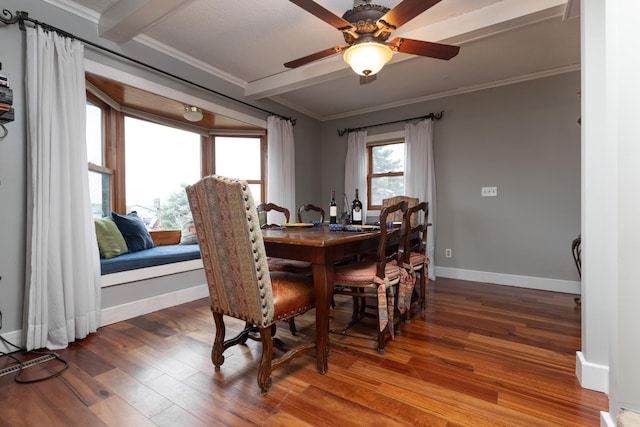 dining space featuring hardwood / wood-style flooring, ceiling fan, and ornamental molding