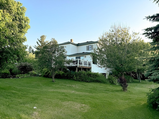 view of yard with a deck