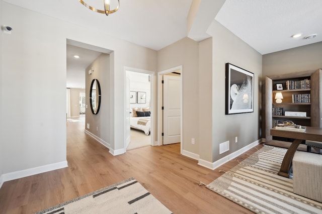 hall featuring light hardwood / wood-style flooring