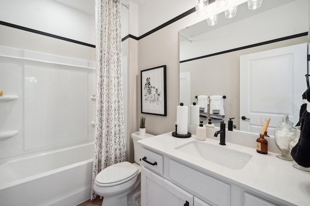 full bathroom featuring vanity, toilet, and shower / bath combo with shower curtain