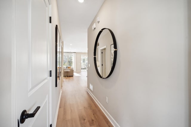 hallway featuring light hardwood / wood-style floors