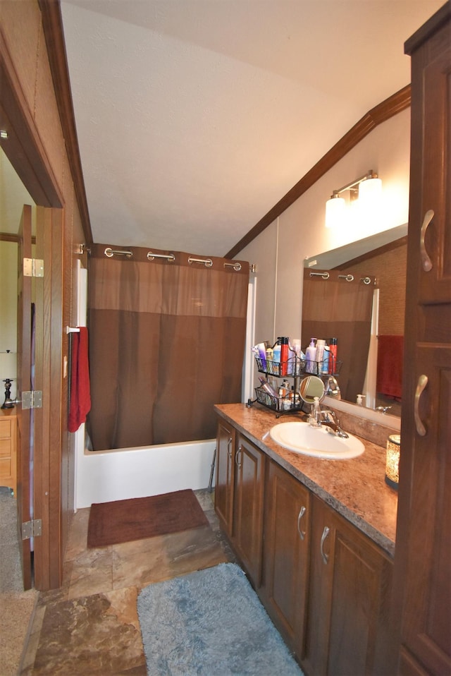 bathroom with ornamental molding, shower / tub combo, vanity, and tile floors