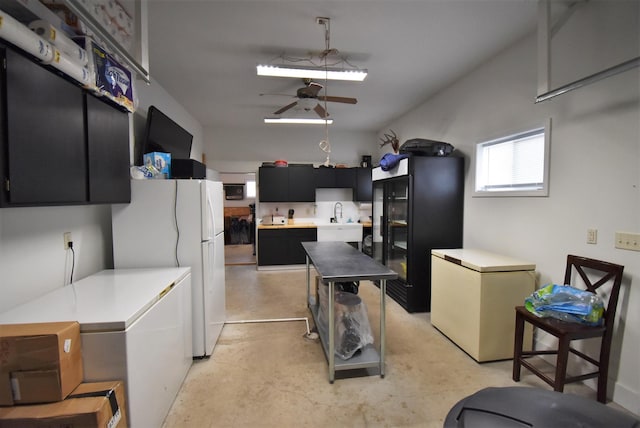 kitchen with white refrigerator, ceiling fan, and fridge