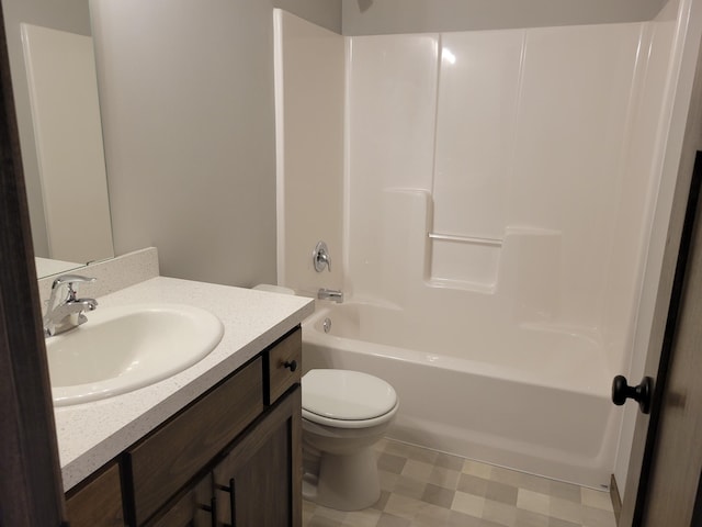 full bathroom with tile flooring, bathtub / shower combination, vanity, and toilet